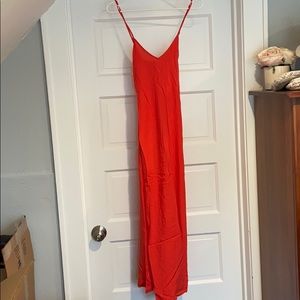 Sundress looks red, but salmon/coral color